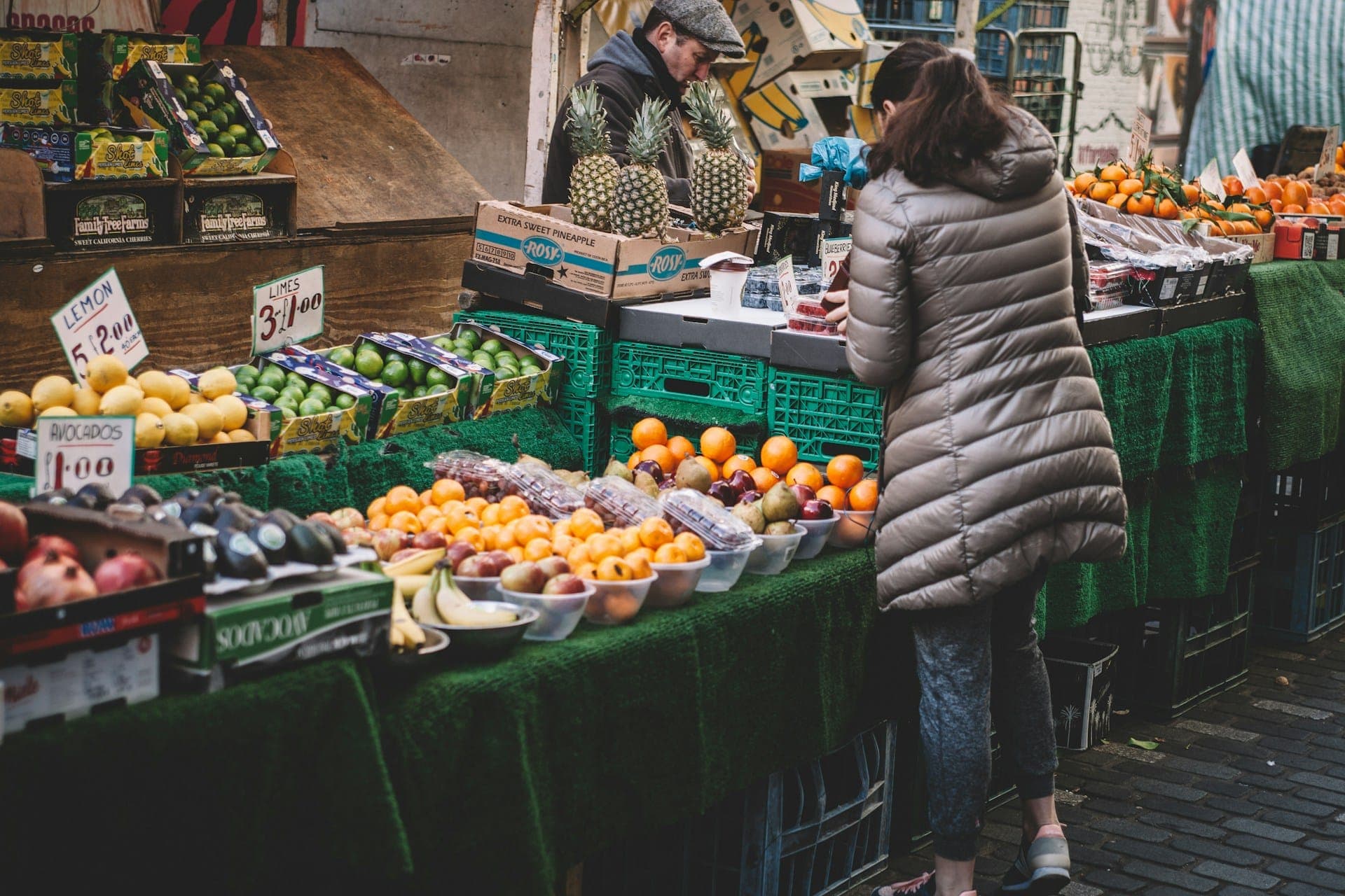 A fruit seller's stall at a London street market.